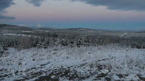 Time lapse of snow covered valley from mountain highway Stock Footage 141227372