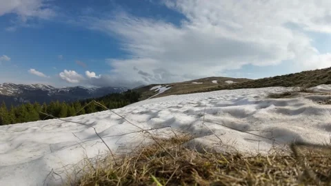 Time lapse of snow melting in alpine environment Stock Footage 242565754