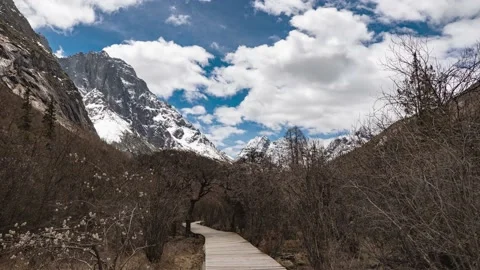 Time lapse snow mountains scene of Sichuan Balang mountain Stock Footage 131065539