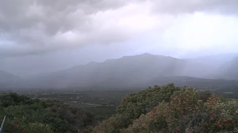 Time lapse of a snowstorm and sunshine over the Ojai Valley, California. Stock Footage 1020102