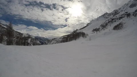 Time lapse on a snowy valley Stock Footage