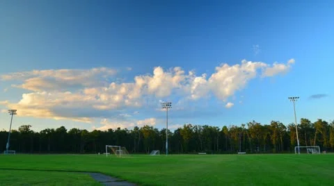 Time Lapse of Soccer Field in evening light with rolling clouds Stock Footage 12008849