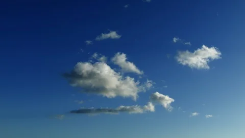 Time Lapse of soft clouds clearing up to blue sky Stock Footage 101007263