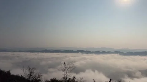 Time-lapse of Spectacular Cloud Waterfall and Sea of Clouds Flowing over Mou Stock Footage 327765278