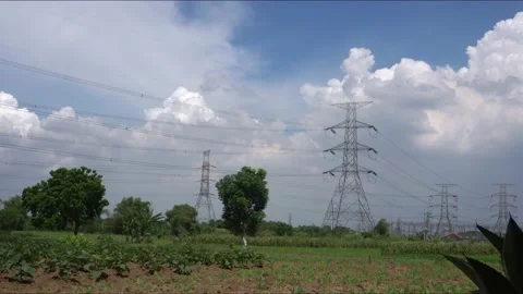 Time lapse spooky dark clouds sky above electric tower Video stock 231256497