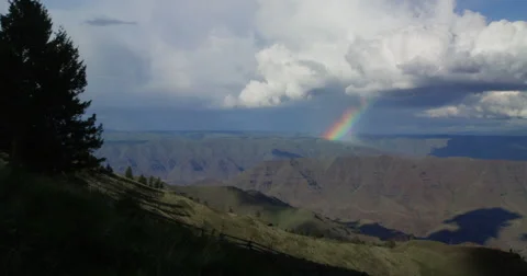 Time lapse of spring rainbow over Hell’s Canyon, Snake River, Oregon Stock Footage 59588661