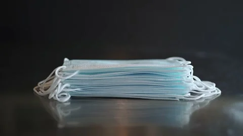 Time lapse a stack of blue close-up medical Stock Footage 148826617