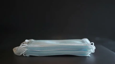 Time lapse a stack of blue close-up medical Stock Footage 148826618