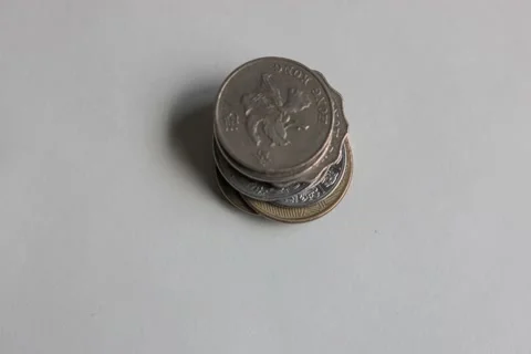 Time lapse from a stack of coins from Brazil, Argentina, Turkey, Indonesia,Thail Video stock 167293781