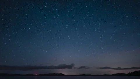 Time lapse of a star sky over a lake Stock Footage 119354615
