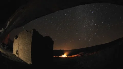 Time lapse of star trails above a Stock Video Pond5