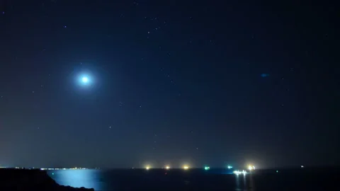 Time lapse of the starry sky and the full moon Stock Footage 137428115