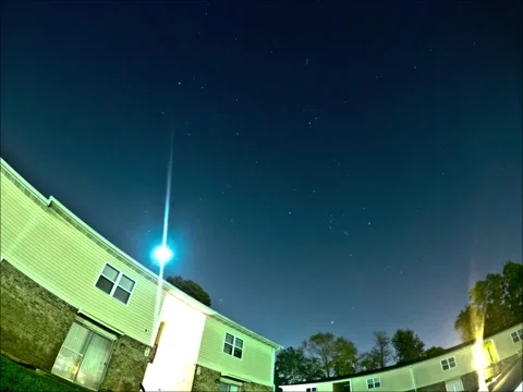 Time lapse of starry sky over the building Stock Footage