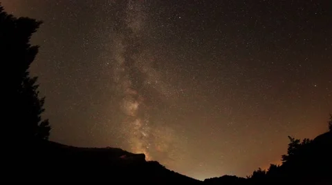 Time lapse of stars behind mountain  Stock Footage 40233346