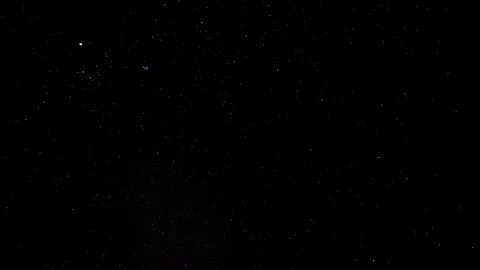 Time lapse of the stars moving across a very dark sky Stock Footage 296537751