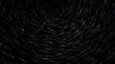 Time lapse of stars moving through the night sky leaving comet like trails Stock Footage 297400618