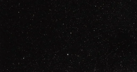 Time lapse of stars at night with clouds passing by Stock Footage 101739489