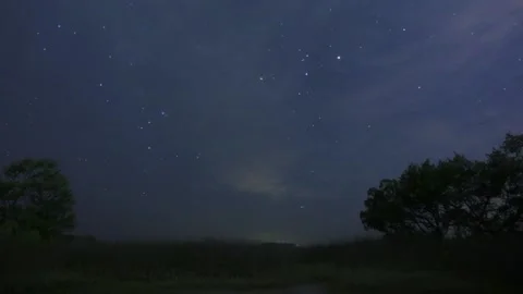 Time Lapse of stars over a marsh Stock Footage 220797920