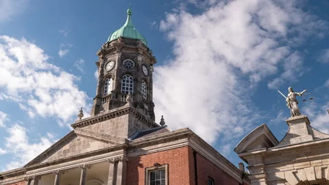 Time lapse of Statue of Justice and Clock Tower at Dublin Castle in Dublin Stock Footage 320612013