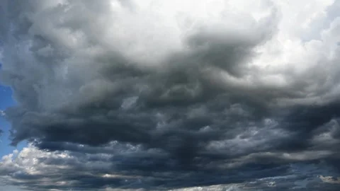Time lapse of a steel gray storm sweeping across the sky, thick clouds rolling Stock Footage 329239268