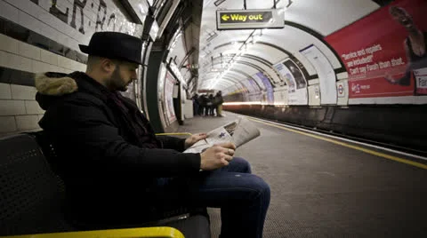 Time Lapse with a still man waiting for the train, underground of London Stock-Footage 22571305