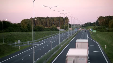 Time-lapse Still Shot Of A New Four-Lane Road With Cars During Sunset Stock-Footage 141997904