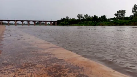 Time lapse Still view of Irwin bridge and Krishna river flowing water. Stock Footage 138534165