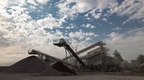 Time Lapse of Stone Being Unloaded In A Crushing Machine Stock Footage 61326478