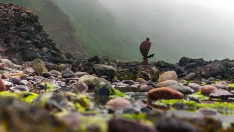 Time Lapse of Stone Stack on Rocky Misty Beach in Scotland Stock Footage 133334271