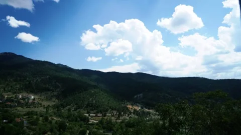 Time lapse storm and rain is coming, dramatic rain clouds approach the hill Stock Footage 202863850
