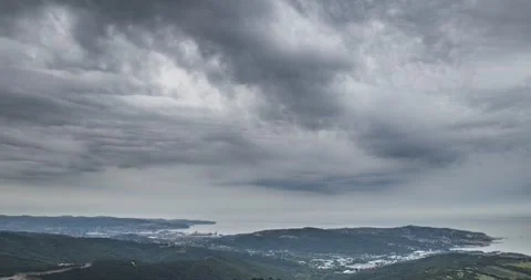 Time lapse of storm cloud moving over town Koper and seaside landscape Stock Footage 138090439
