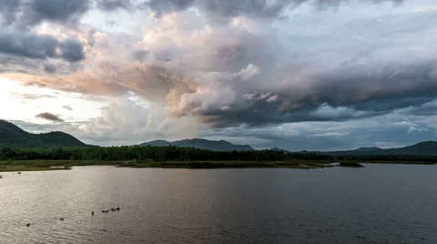 Time lapse - storm clouds above the reservoir_zoom shot Stock Footage 66897316