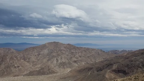 Time lapse of storm clouds forming over desert mountains near Palm Springs Stock Footage 87611450