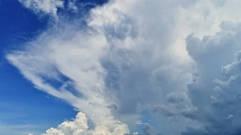 Time-lapse of storm clouds forming on a blue sky day Stock Footage 123950304