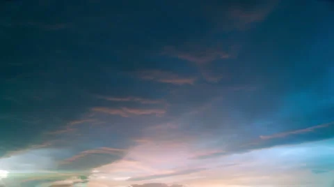 Time-lapse storm clouds in moody colorful sky. Stock Footage
