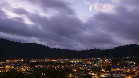 Time lapse of storm clouds moving over mountain range Stock Footage 78637368