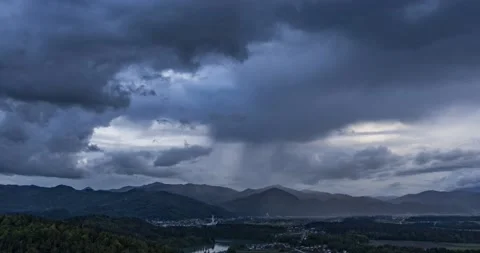 Time lapse of storm clouds moving over hills in Slovenia Stock Footage 154195154