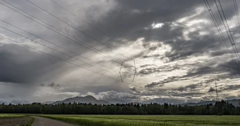 Time lapse of storm clouds moving over farming field Stock Footage 154195235