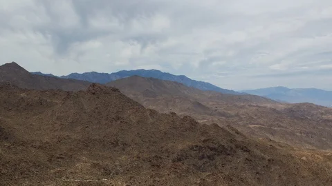 Time lapse of storm clouds over Mount San Jacinto and a distant Mount Gorgonio Stock Footage 108505143