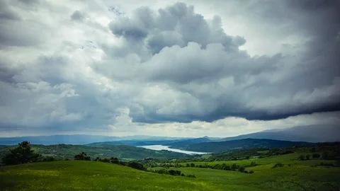 Time Lapse - Storm Clouds over Tuscany Italy - 4K Stock Footage 117163602