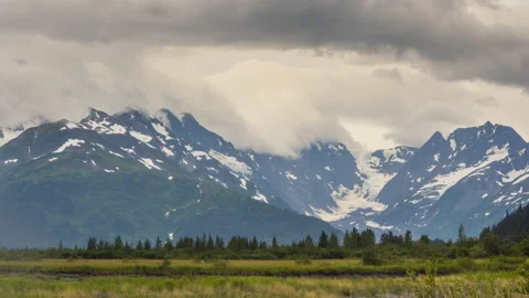 Time lapse of  storm clouds over mountains Stock Footage 164893688