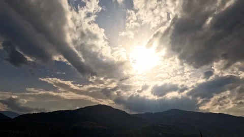 Time lapse of storm clouds over sunny hills Stock Footage 315783733