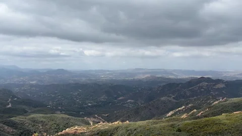 Time lapse of storm clouds over Topanga canyon Video stock 347254977