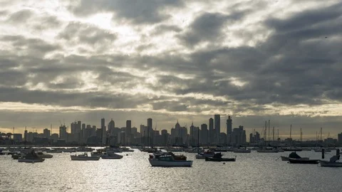 A time lapse of storm clouds passing over backlit skyline. Stock Footage 111299086