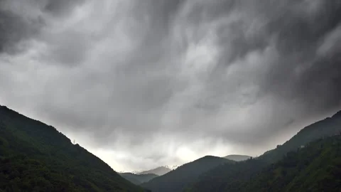 Time lapse storm clouds before rain over dense - Rainstorm Sky and Cloud Layers Stock Footage 339576394
