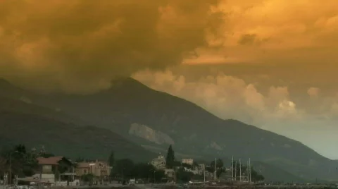 Time-lapse storm clouds rising over mountain Stock Footage 310478