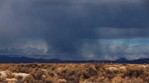 Time lapse storm clouds travel over a desert - Time Lapse 2048 HD, 4K Stock Footage 58094359