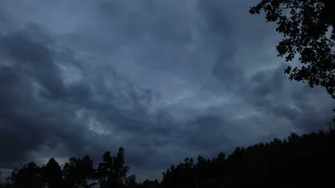Time lapse storm is coming. Dramatic rain clouds approach the hill Stock Footage 211868132