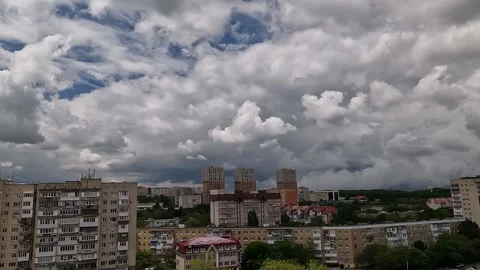 Time-lapse of a storm front approaching a city Stock Footage 337302191