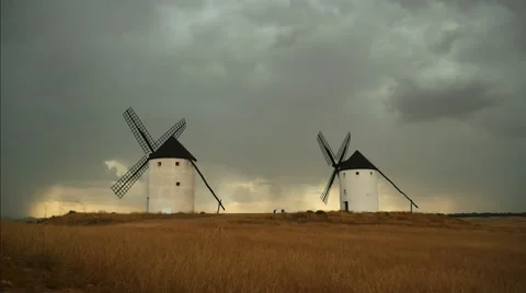 Time lapse of storm front cloudscape with famous white windmills of la mancha Stock Footage 65936824